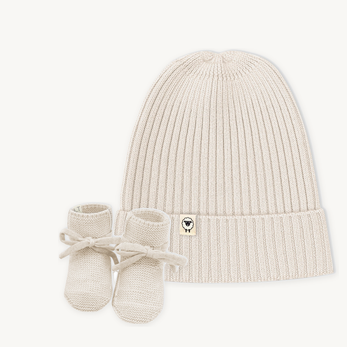Geschenkset Mütze Emma und Babyschuhe Toni in creme – Lille Toni